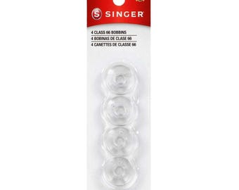May include: A package of four clear plastic Singer Class 66 bobbins. The package has a red top with the Singer logo and text in English, Spanish, and French.