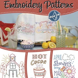 May include: Aunt Martha's Embroidery Patterns book with designs for the four seasons. The cover features embroidered images of summer fun, school days, hot cocoa, and spring flowers. The book includes the text "IRON ON".