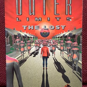 May include: Book cover for "The Outer Limits: The Lost" by John Peel. The cover features a red sky, a street lined with robotic figures, and a person walking towards them. The title is in silver letters.