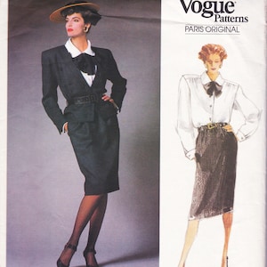 May include: A vintage Vogue Patterns sewing pattern for a black and white skirt suit. The pattern is for size 12 and includes a white blouse with a bow tie. The pattern is from the Paris Original collection and is number 1784.