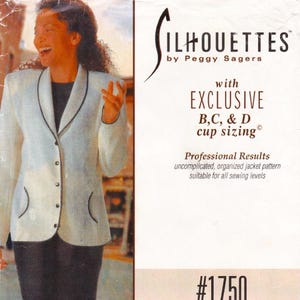 May include: A light-colored jacket with black trim and a black top. The jacket has a classic design with a notched collar and button closure. The image also includes text that reads "SILHOUETTES by Peggy Sagers" and "EXCLUSIVE B,C, & D cup sizing".