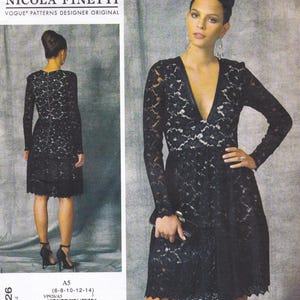 May include: A black lace dress with a deep V-neckline and long sleeves. The dress has a fitted bodice and a flared skirt. The pattern number VP926/A5 is printed on the bottom of the image.