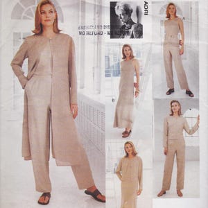 May include: A sewing pattern envelope for a beige ensemble by Adri, featuring a long-sleeved duster coat, a sleeveless dress, a cropped jacket, and trousers. The images display various combinations of these garments in a neutral, light-colored fabric.