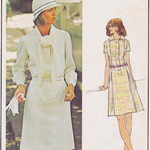 May include: Two vintage sewing patterns for dresses. The first pattern shows a white dress with a long sleeve and a tie at the neck. The second pattern shows a plaid dress with short sleeves and a belt.