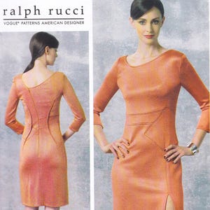 May include: A coral-coloured dress with a scoop neck and three-quarter sleeves. The dress has a fitted silhouette and a slit in the front. The dress is designed by Ralph Rucci for Vogue Patterns.