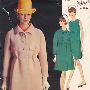 May include: Vintage fashion illustration featuring a woman in a light pink coat and yellow hat. The illustration also shows two women in green dresses. The text "Fabiani of Italy" is visible.
