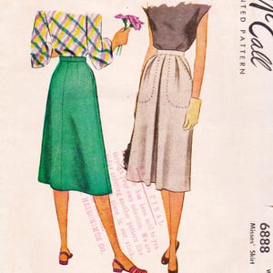 May include: Vintage sewing pattern showing two skirt designs. One skirt is paired with a plaid top, the other with a solid top. The pattern includes the text "6888 Misses' Skirt" and "HEIRONIMUS Co."