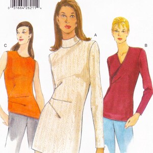 May include: A sewing pattern showing three women's tops. The designs include a cream-coloured mock turtleneck with long sleeves, an orange sleeveless top, and a burgundy wrap top with long sleeves. A barcode is visible at the top.