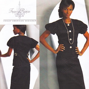 May include: A black and white striped skirt suit with a fitted jacket and a skirt that has a slight A-line shape. The jacket has a V-neckline and short, puffed sleeves. The skirt has a high waist and a slightly flared hem. The suit is designed by Tracy Reese, a Vogue American designer.