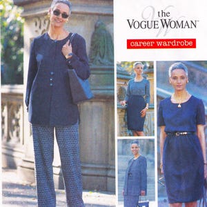 May include: An image from "The Vogue Woman" featuring a career wardrobe. The main image shows a woman in a navy blue button-down top and patterned trousers, carrying a blue tote bag. Additional images showcase other navy blue outfits.