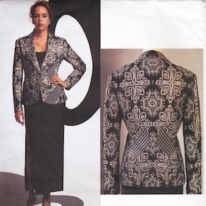 May include: A black and gold patterned blazer and a black skirt. The blazer has a distinctive design and a striped detail on the front. The image also shows the back of the blazer, emphasizing the detailed pattern.