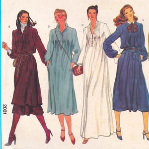 May include: Illustration of four vintage dresses in various styles and colors. The dresses include a burgundy dress with a tiered skirt, a light blue dress, a white dress, and a navy blue dress. Each dress has unique design elements.