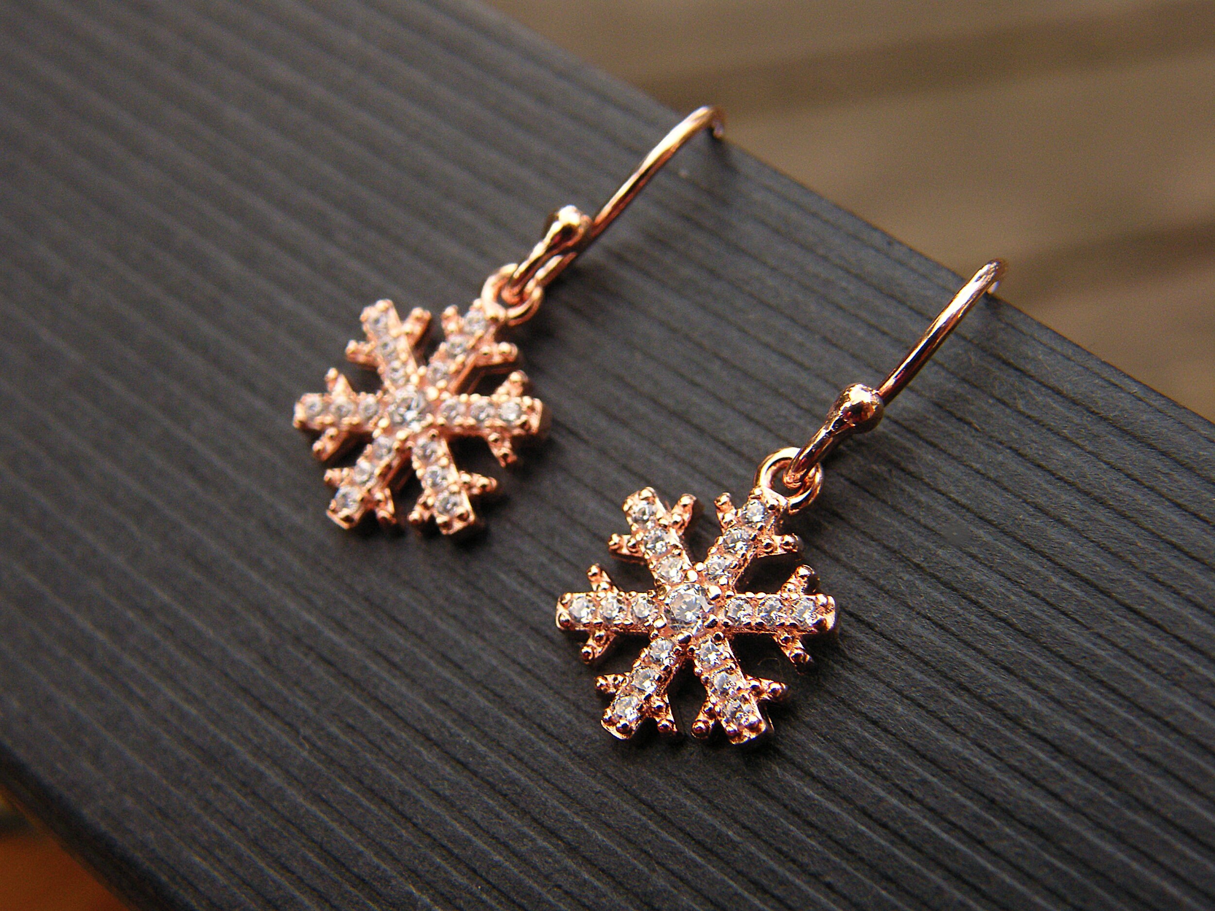 Rose gold snowflake earrings top