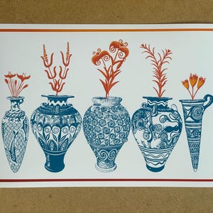 May include: A print featuring five stylized vases in shades of blue, each holding orange floral arrangements. The vases have intricate patterns and are set against a white background with a red border. The artwork evokes a classical aesthetic.