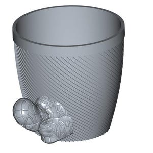 Peut inclure: Un récipient cylindrique gris avec un motif rayé diagonal texturé. Le récipient présente un motif décoratif tridimensionnel stylisé d'un groupe de sphères sur le côté.