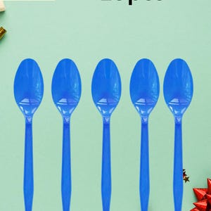 May include: Five blue plastic spoons arranged in a row. The spoons have an oval bowl and a long, thin handle. The text "Plastic spoon 10pcs" is at the top of the image. The logo for "Oddity Wonders" is in the upper left corner.