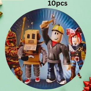 May include: A 9-inch paper plate featuring a colorful illustration of four cartoon characters. The plate has the text "9 inch paper plate A 10pcs" in black. The plate is on a light green background.