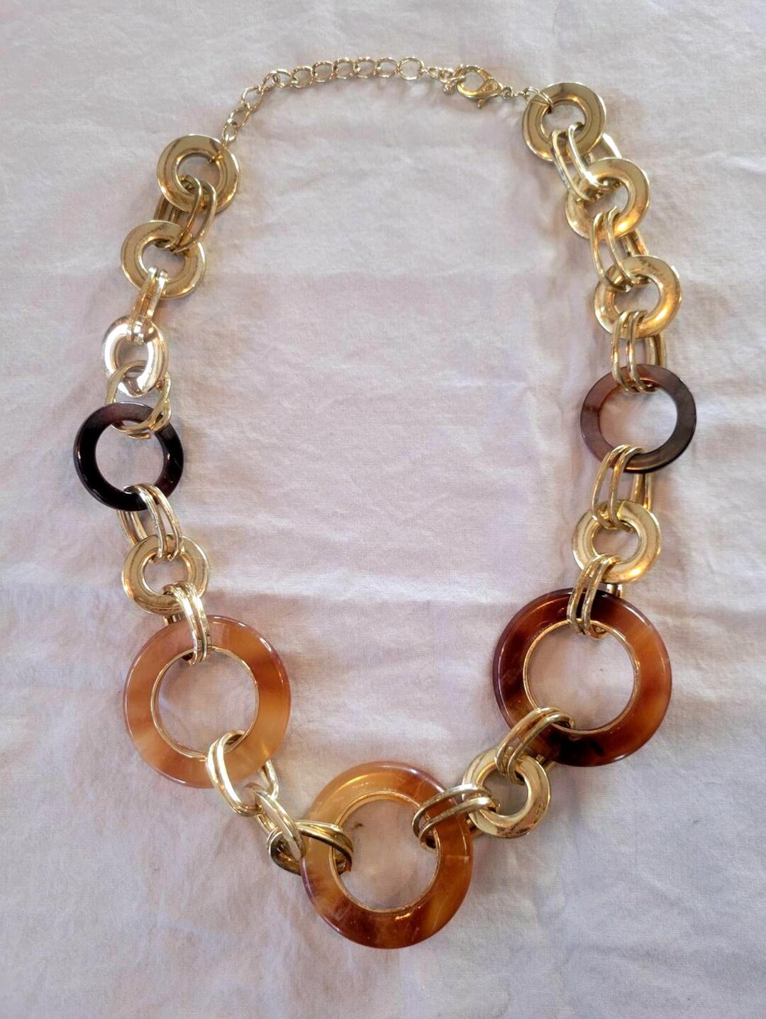 70s tortoiseshell lucite pavé knot collar necklace main image 1
