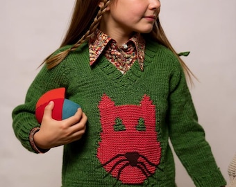 Suéter verde vintage para niña de los años 70 con gato rojo. Patrón de punto (descarga en PDF).