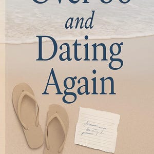 May include: Book cover titled "Over 50 and Dating Again" by Kendra Bennett. The image features beige flip-flops and a handwritten note on a sandy beach, with the sea visible in the background.