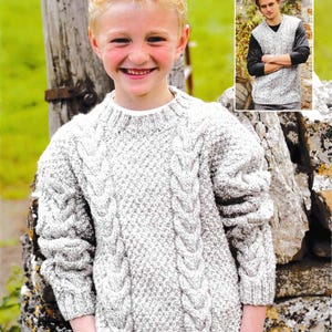 May include: A light gray cable-knit sweater with a textured pattern. The sweater has a crew neck and long sleeves with cable detailing. The image also includes a smaller image of a cable-knit vest. Measurements are 61-66/112/117 inches and 24/26-44/46 inches.