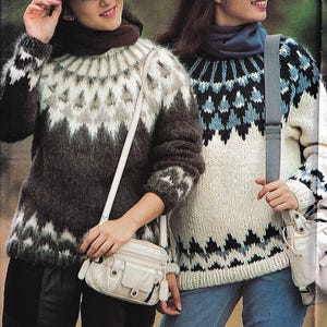 May include: Two women wearing patterned knit sweaters. One sweater is brown, white, and gray, the other is white, blue, and black. Both are wearing small white crossbody bags. The sweaters have a geometric design.
