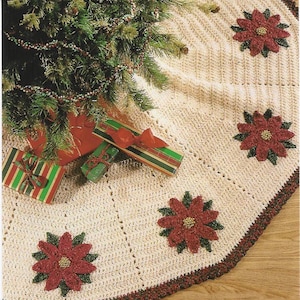 May include: Cream-colored, crocheted Christmas tree skirt with a decorative border and poinsettia accents. The skirt is placed around a decorated Christmas tree with wrapped gifts underneath. The poinsettias are red with green leaves.