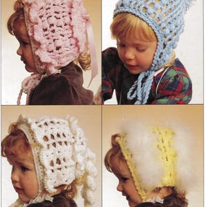 May include: Four crochet bonnets in pastel colors. The bonnets are pink, blue, white, and yellow. The pink bonnet has a ribbon tie. The blue bonnet has a pom-pom and ties. The white bonnet has a ruffled edge. The yellow bonnet has a fluffy trim.