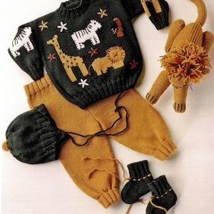 May include: A knitted baby outfit in dark green and mustard yellow. The set includes a sweater with animal appliqués, pants, a hat, socks, and a lion toy. The sweater features a giraffe, lion, and zebra design. The lion toy is approximately 10 inches long.