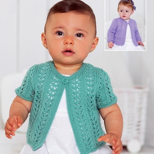 May include: A baby in a teal green knitted bolero with a single button fastening. The bolero features a delicate openwork pattern. A smaller image shows a baby wearing a similar purple bolero.