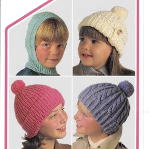 May include: Four children's knitted hats in different styles and colours. The hats include a light green balaclava, a cream beanie with a button, a pink ribbed hat with a pom-pom, and a blue cable-knit hat with a pom-pom. Text reads "D.K. and Chunky".