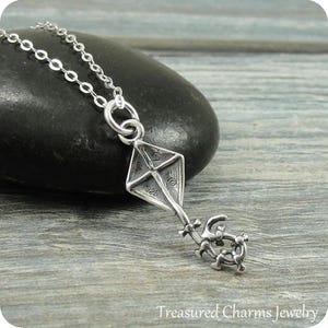 Kite necklace with red string deals