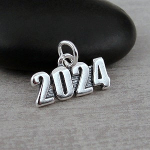 Compass 2024 Lucky Charm in Sterling Silver plated in Platinum