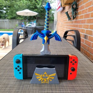 Master Sword in the stone style controller stand image 9