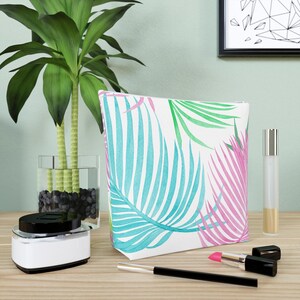 Grande bolsa de cosméticos com padrão de folhas coloridas