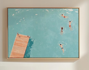 May include: A framed wall art print featuring an aerial view of a wooden dock extending into calm turquoise water. Four individuals are swimming in the water, each wearing colorful swimwear, creating small ripples on the surface of the sea.