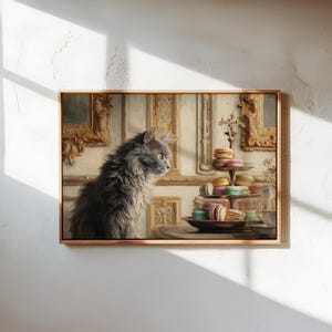 May include: A framed painting depicts a gray cat gazing at a tiered dessert stand laden with colorful macarons. The artwork has a vintage aesthetic, with ornate gold frames and a soft, warm color palette. The cat's fur is detailed, and the macarons are in various pastel shades.