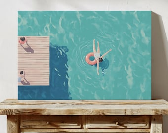 May include: A woman floats on a pink inflatable ring in a turquoise blue body of water. A wooden dock with two figures standing on it is visible in the background.