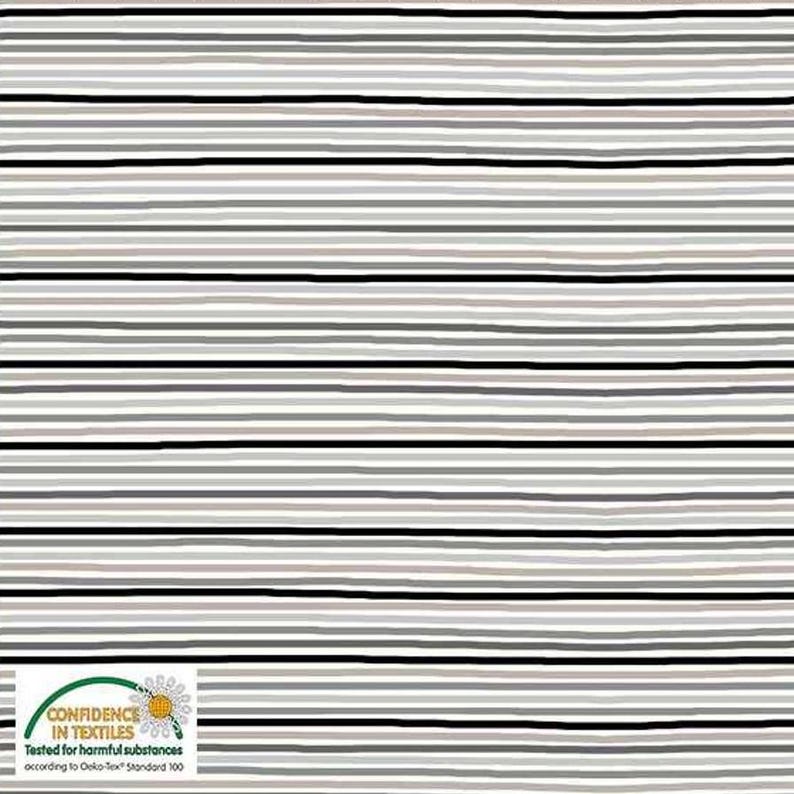 May include: A fabric with a repeating pattern of horizontal stripes in varying shades of gray, black, and white. The stripes are of varying widths and are slightly uneven, giving a hand-drawn appearance. The bottom left corner features a logo with text.