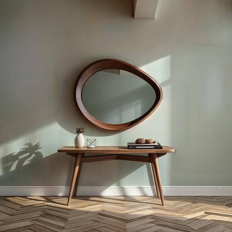 Both aesthetic and functional circular will be indispensable for your bedroom. 
The minimalist asymmetrical walnut mirror goes well with both classic and contemporary decor styles.