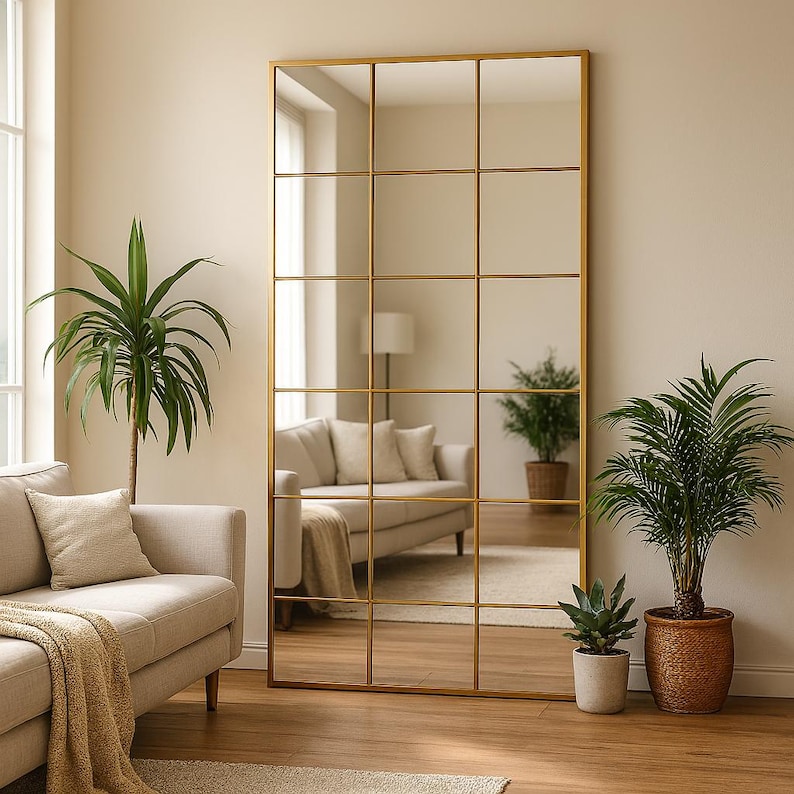 Reflect your style with asymmetrical tall mirror, which is the perfect decorative option for your bedroom. The organic form mirror with gold edging adds sophistication to modern and luxurious interiors.