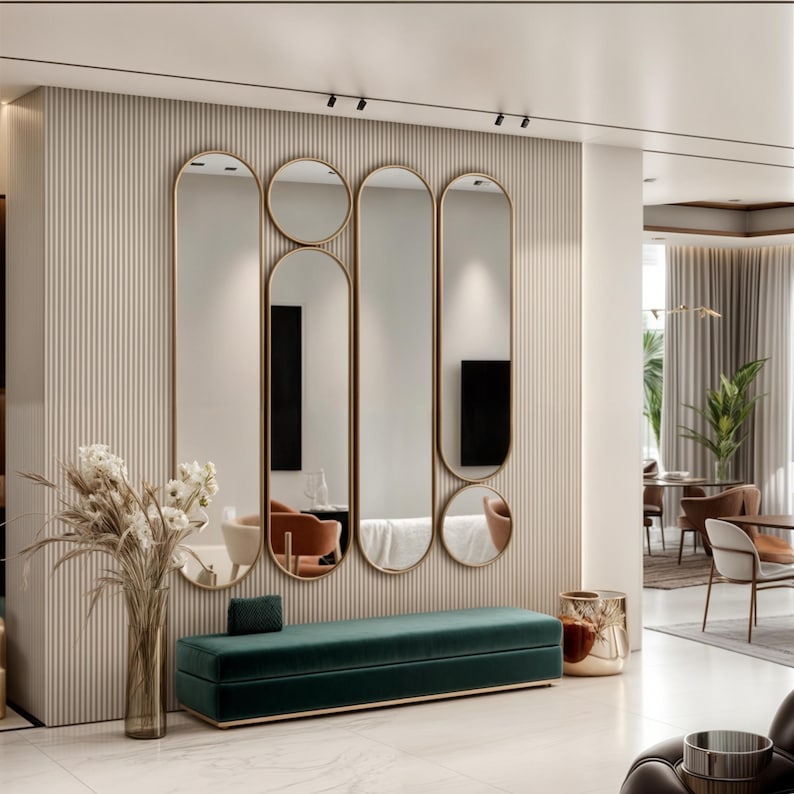 Reflect your style with asymmetrical tall mirror, which is the perfect decorative option for your bedroom. The organic form mirror with gold edging adds sophistication to modern and luxurious interiors.