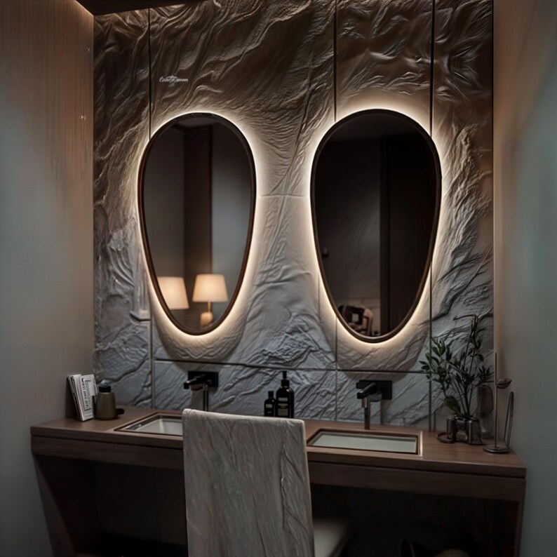 Vanity Asymmetrical Led Mirror can change your home spaces. A luxurious and elegant decorative touch for the living room, hallway or bathroom.