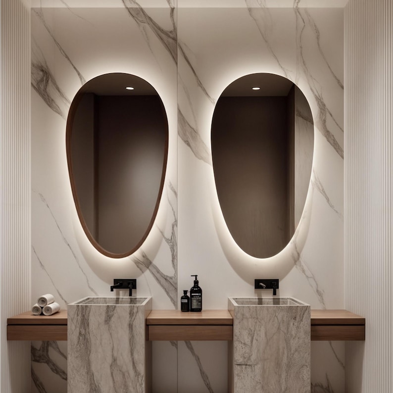 Reflect your style with Modern LED mirror, which is the perfect decorative option for your bedroom. The asymmetric wall mirror with LED lighting offers a stylish design for modern bathrooms and vanity areas.