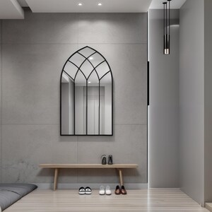 The abstract mirror will add a modern atmosphere to your spaces. The handmade fireplace mirror offers a unique aesthetic to your space thanks to its original design.