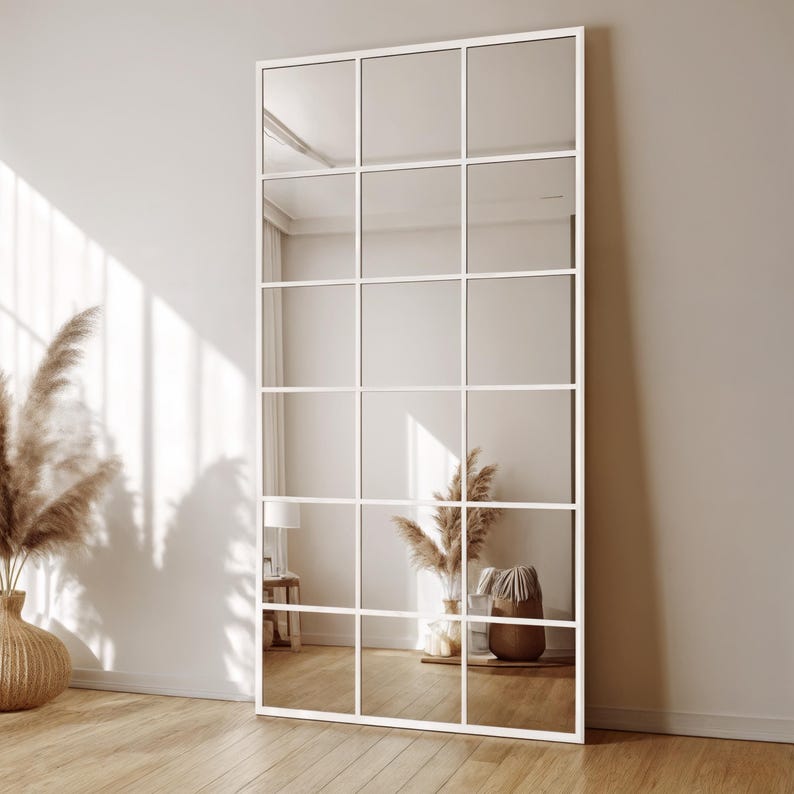 Reflect your style with asymmetrical tall mirror, which is the perfect decorative option for your bedroom. The organic form mirror with gold edging adds sophistication to modern and luxurious interiors.