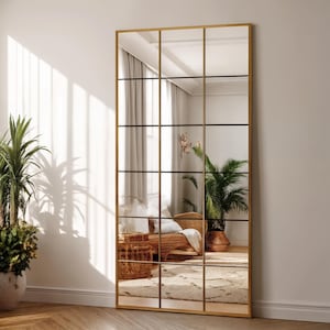 The abstract mirror will add a modern atmosphere to your spaces.
The handmade fireplace mirror offers a unique aesthetic to your space thanks to its original design.