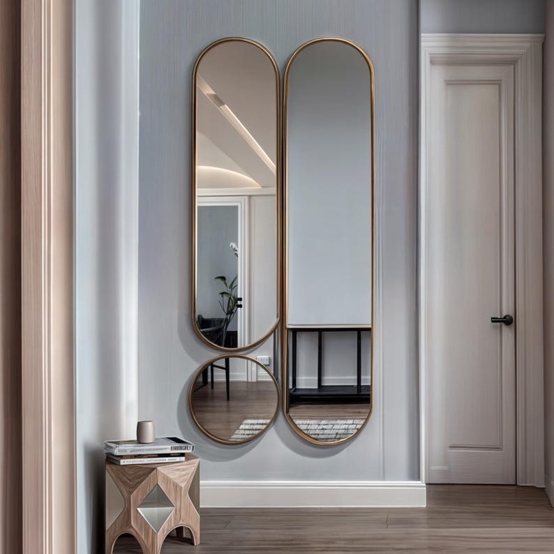 Both aesthetic and functional gold framed mirror will be indispensable for your bedroom. 
The minimalist full body decorative wall mirror goes well with both classic and contemporary decor styles.