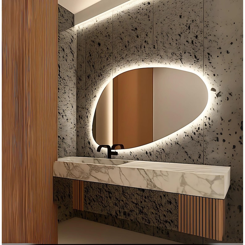 The bedroom LED Mirror, which attracts attention with its modern design, is the best option to reflect your style. The warm white LED lighting adds a pleasant ambience to your environment.