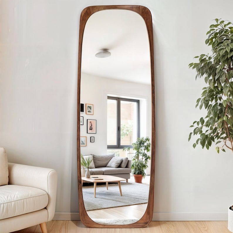 Always look perfect with the wooden floor mirror that will illuminate your makeup routine. Designed like a piece of decorative art, the organic mirror fits easily into bohemian, modern or minimal styles.